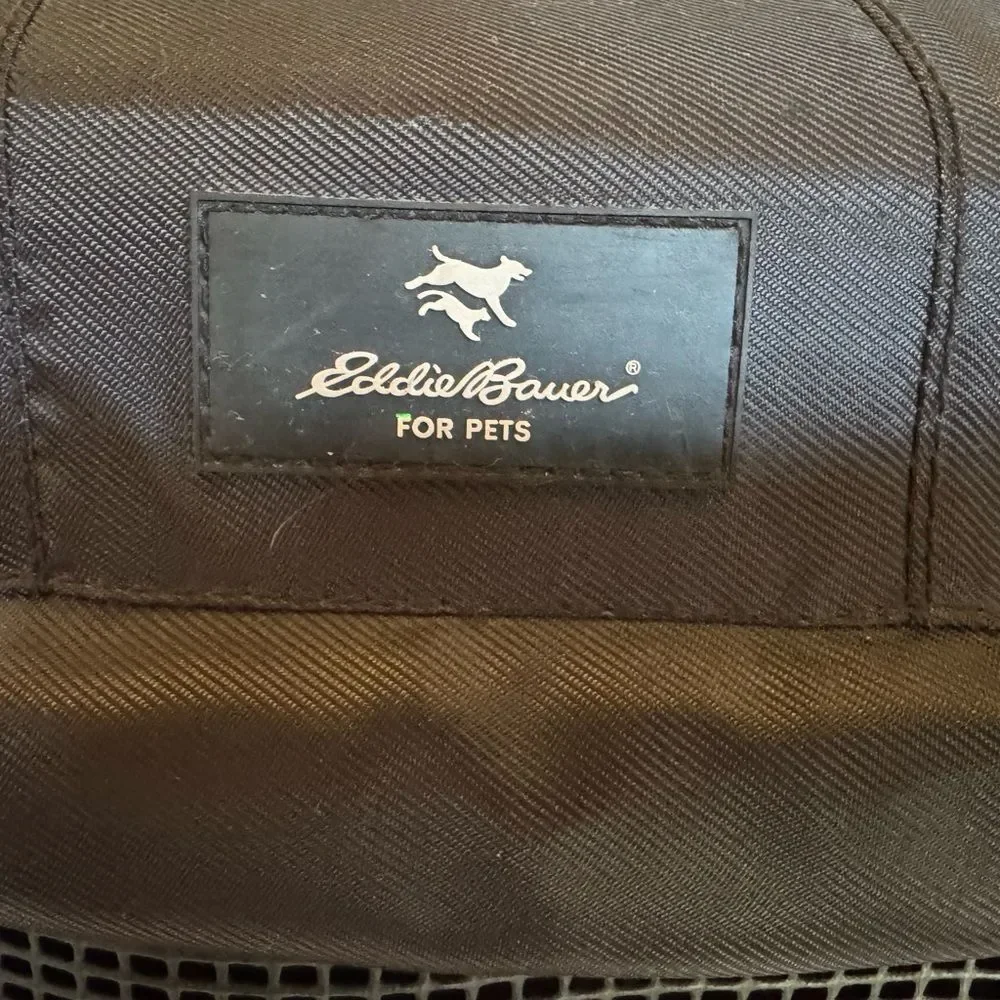 Eddie Bauer black expandable handle, rolling small pet carrier. ￼